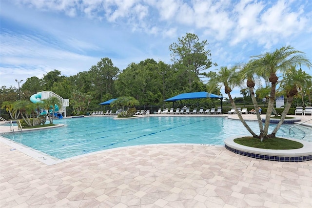 2534 Double Tree Pl, Oviedo, FL 32766 - community pool featuring a patio area and a water slide