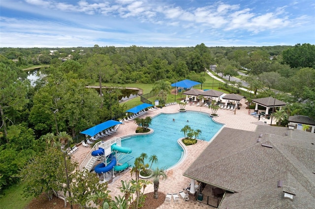 2534 Double Tree Pl, Oviedo, FL 32766 - community pool featuring a patio and a wooded view