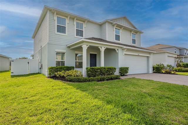 3840 Fescue St, Clermont, FL 34714 - view of front of property with driveway, a garage, a gate, stucco siding, and a porch
