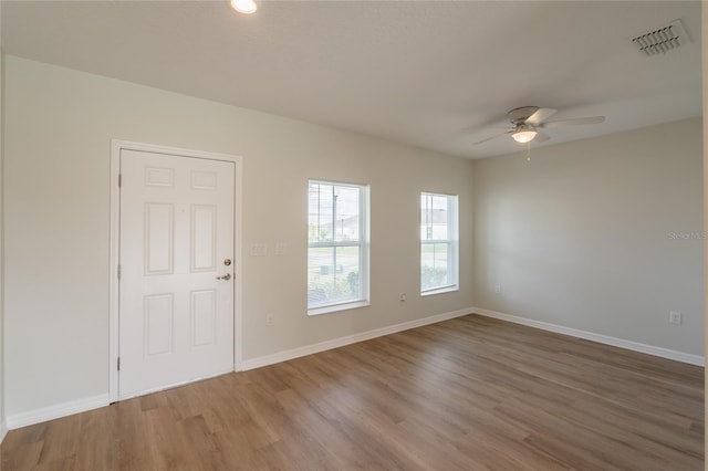 3840 Fescue St, Clermont, FL 34714 - spare room with a ceiling fan and wood finished floors