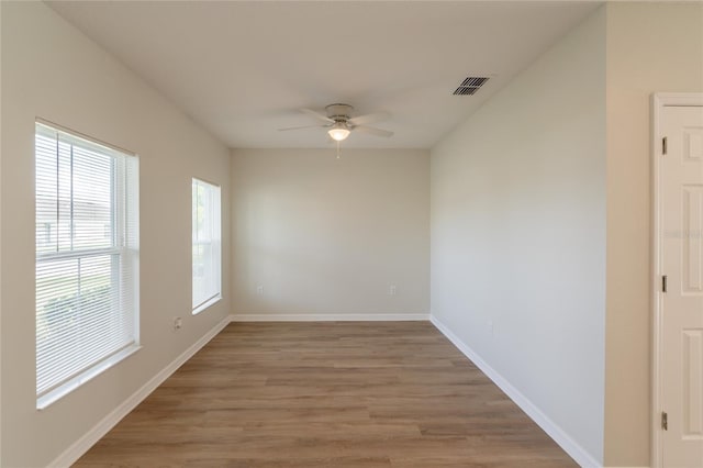 3840 Fescue St, Clermont, FL 34714 - spare room with a ceiling fan and light wood-style floors