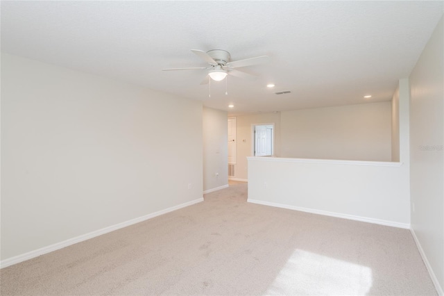 3840 Fescue St, Clermont, FL 34714 - spare room featuring a ceiling fan, light colored carpet, and recessed lighting
