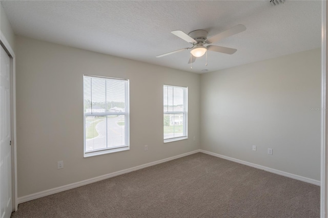 3840 Fescue St, Clermont, FL 34714 - empty room with carpet floors and a ceiling fan
