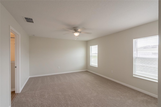 3840 Fescue St, Clermont, FL 34714 - empty room with a ceiling fan and light colored carpet