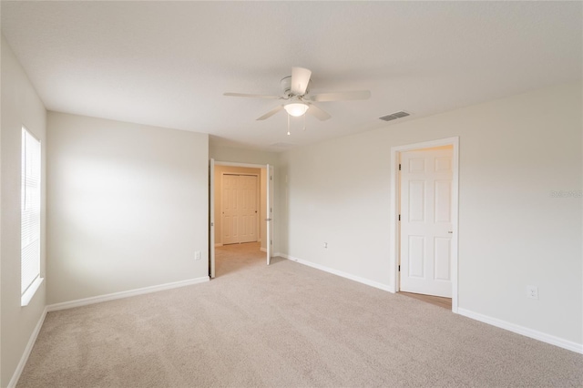 3840 Fescue St, Clermont, FL 34714 - carpeted spare room featuring a ceiling fan and healthy amount of natural light