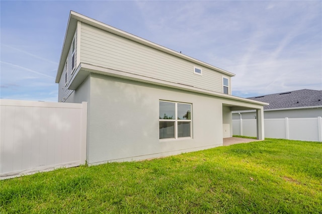 3840 Fescue St, Clermont, FL 34714 - back of house with a patio and stucco siding