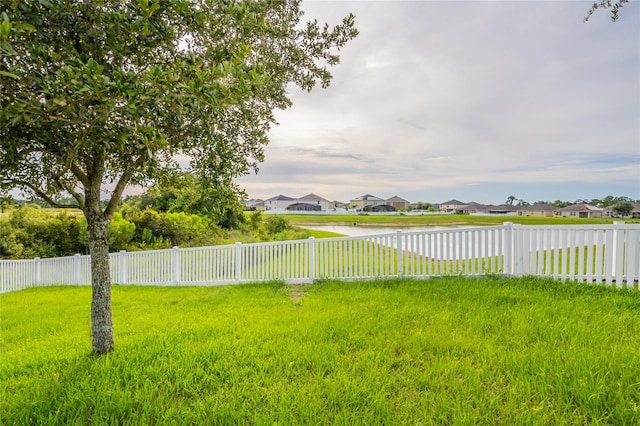 3840 Fescue St, Clermont, FL 34714 - fenced backyard with a residential view and a water view