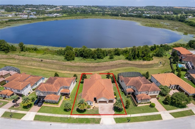 3546 Mediterra Dr, Clermont, FL 34711 - aerial perspective of suburban area featuring a large body of water and property parcel outlined