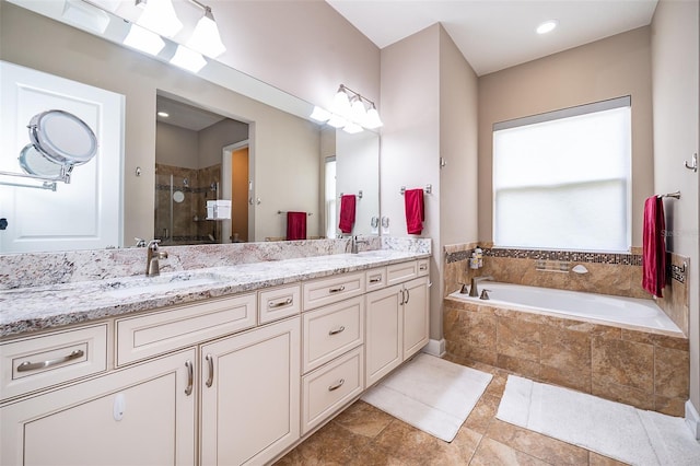 3546 Mediterra Dr, Clermont, FL 34711 - bathroom featuring a shower stall, double vanity, and a bath