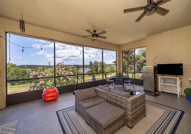 3546 Mediterra Dr, Clermont, FL 34711 - sunroom / solarium featuring a ceiling fan and outdoor dining space