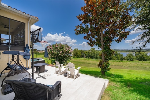 3546 Mediterra Dr, Clermont, FL 34711 - view of patio / terrace featuring a water view and ceiling fan