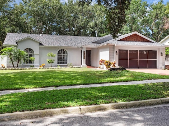 15718 Carriage Hill Ct, Clermont, FL 34711 - single story home with stucco siding, a garage, a front lawn, driveway, and a shingled roof