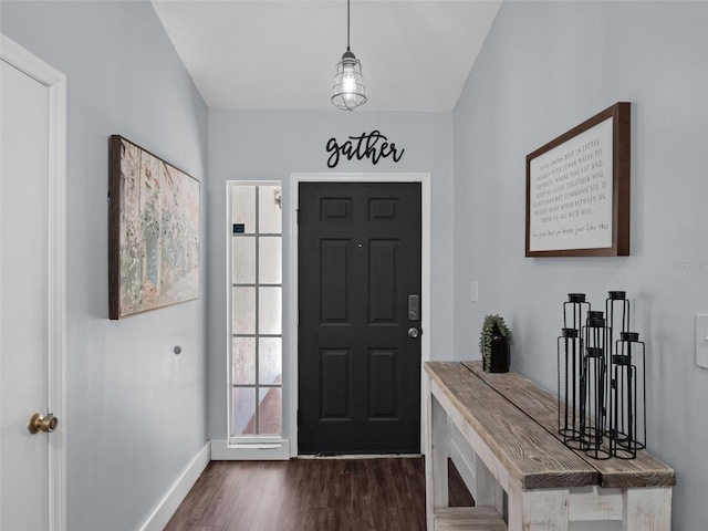 15718 Carriage Hill Ct, Clermont, FL 34711 - foyer entrance with dark wood-style floors and baseboards