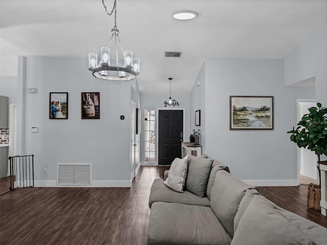 15718 Carriage Hill Ct, Clermont, FL 34711 - living room with a chandelier and dark wood finished floors
