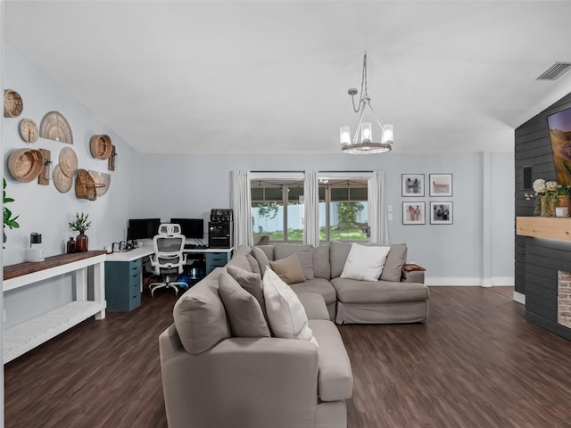 15718 Carriage Hill Ct, Clermont, FL 34711 - living room with a desk, dark wood-style floors, a fireplace, a chandelier, and lofted ceiling