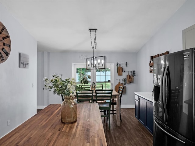 15718 Carriage Hill Ct, Clermont, FL 34711 - dining space with dark wood-style floors and a chandelier