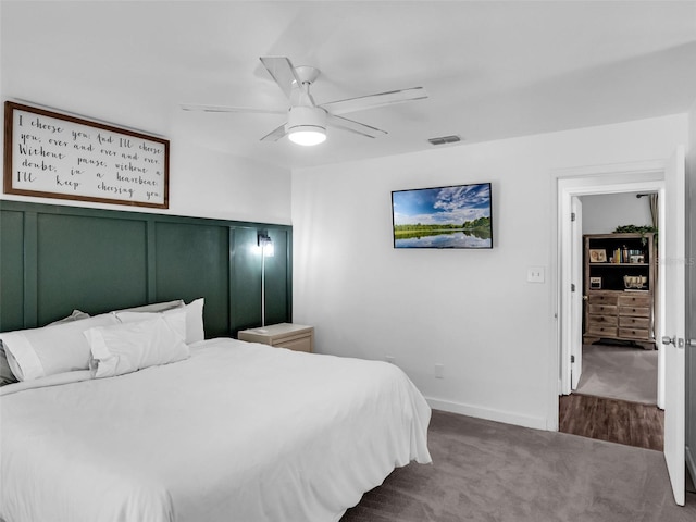 15718 Carriage Hill Ct, Clermont, FL 34711 - carpeted bedroom with ceiling fan and baseboards