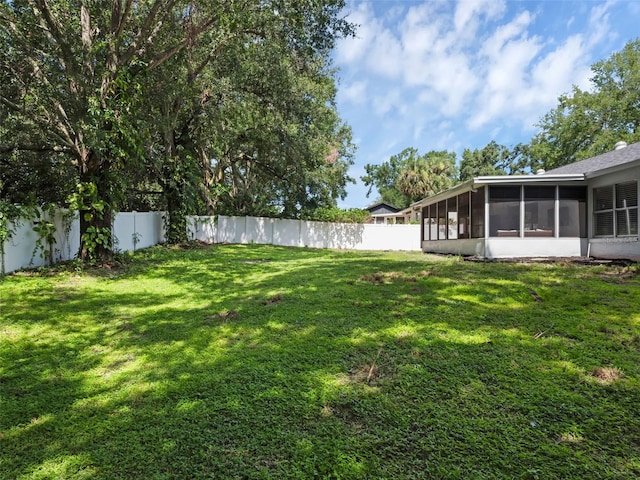 15718 Carriage Hill Ct, Clermont, FL 34711 - fenced backyard with a sunroom