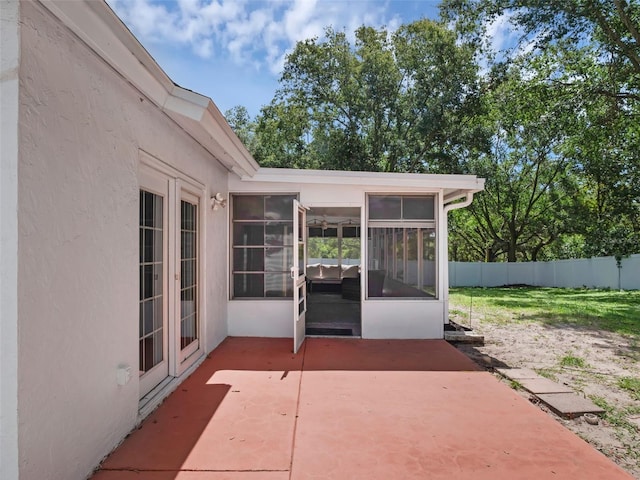 15718 Carriage Hill Ct, Clermont, FL 34711 - view of patio featuring a sunroom and french doors