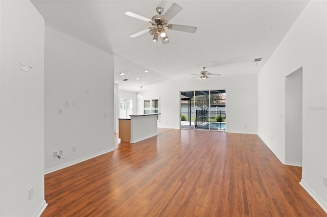 11341 Autumn Wind Loop, Clermont, FL 34711 - unfurnished living room with a ceiling fan, wood finished floors, and recessed lighting