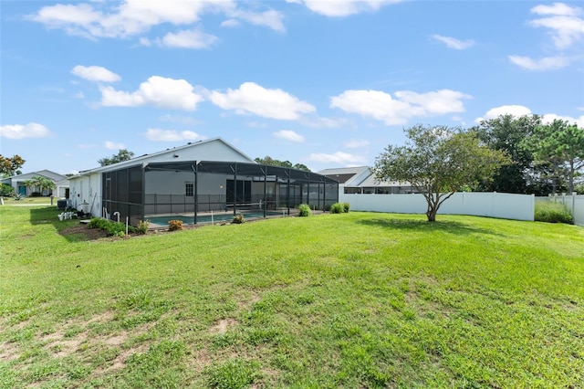 11341 Autumn Wind Loop, Clermont, FL 34711 - view of yard with a swimming pool and glass enclosure