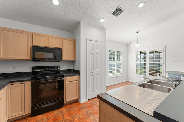 11341 Autumn Wind Loop, Clermont, FL 34711 - kitchen featuring black appliances, dark countertops, light brown cabinets, a chandelier, and a textured ceiling