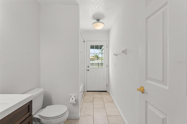 11341 Autumn Wind Loop, Clermont, FL 34711 - bathroom with vanity, a textured ceiling, tile patterned floors, and shower / washtub combination