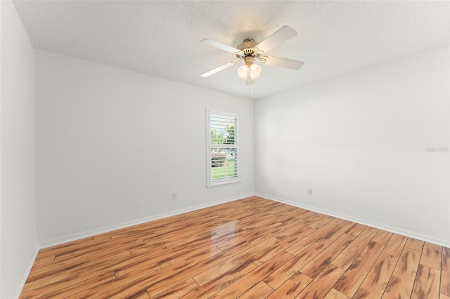 11341 Autumn Wind Loop, Clermont, FL 34711 - spare room with light wood-style floors and a ceiling fan