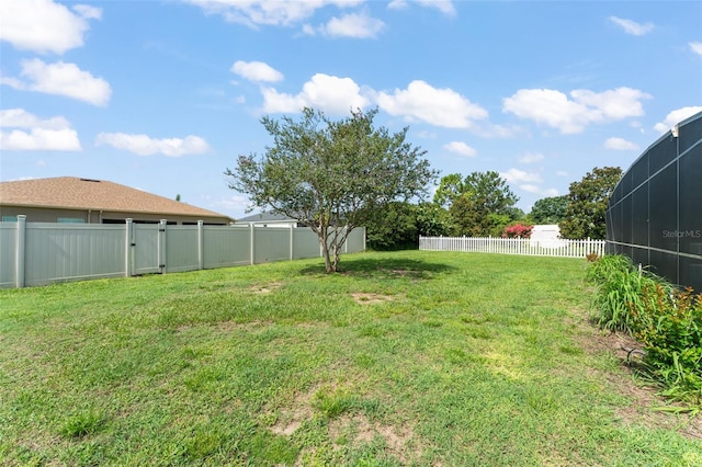 11341 Autumn Wind Loop, Clermont, FL 34711 - fenced backyard with glass enclosure