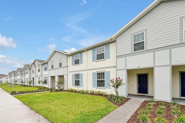 927 Paradise Dr, Davenport, FL 33897 - view of property featuring a residential view and a front lawn