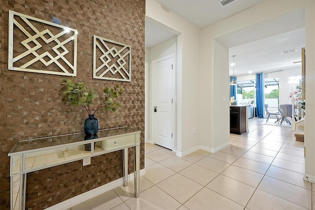 927 Paradise Dr, Davenport, FL 33897 - hall with baseboards and tile patterned floors