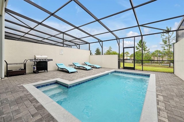 927 Paradise Dr, Davenport, FL 33897 - swimming pool featuring a patio area, a grill, and a lanai