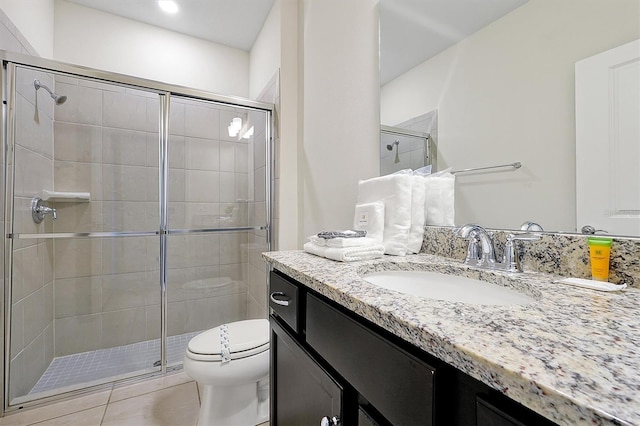 927 Paradise Dr, Davenport, FL 33897 - full bathroom featuring vanity, a stall shower, and tile patterned flooring