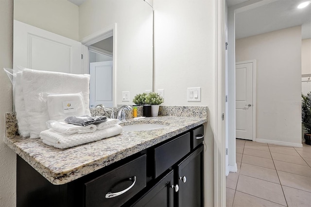 927 Paradise Dr, Davenport, FL 33897 - bathroom featuring vanity and tile patterned floors