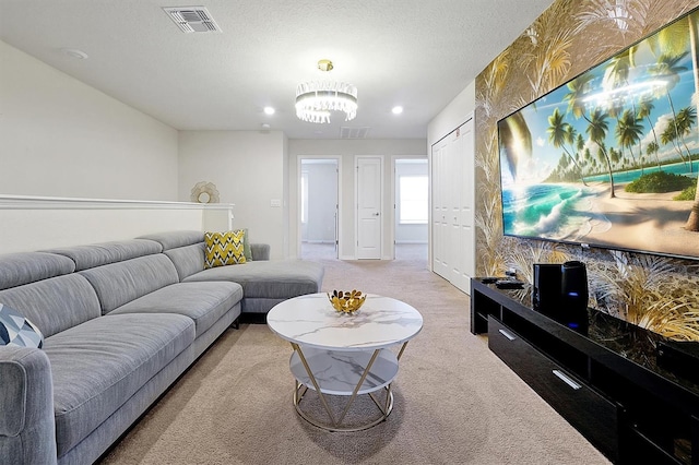 927 Paradise Dr, Davenport, FL 33897 - living area featuring light colored carpet, a chandelier, and recessed lighting