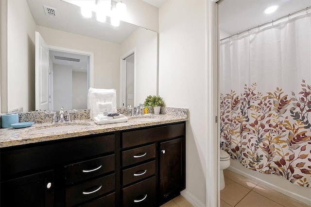 927 Paradise Dr, Davenport, FL 33897 - bathroom with double vanity, tile patterned floors, and shower / bathtub combination with curtain