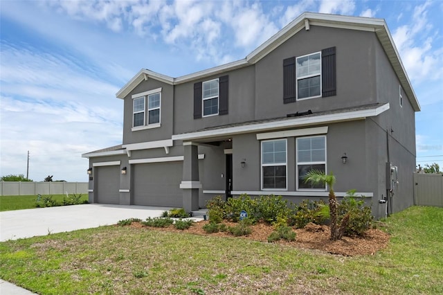 617 Hitch Loop, Saint Cloud, FL 34772 - traditional-style home featuring stucco siding, an attached garage, and driveway
