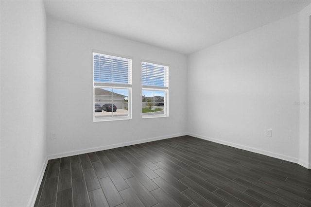 617 Hitch Loop, Saint Cloud, FL 34772 - empty room featuring dark wood-style floors