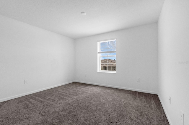 617 Hitch Loop, Saint Cloud, FL 34772 - unfurnished room with carpet flooring and baseboards