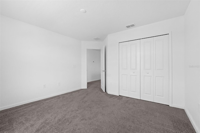 617 Hitch Loop, Saint Cloud, FL 34772 - unfurnished bedroom with carpet floors and a closet