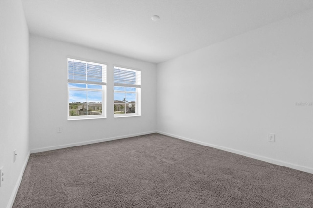 617 Hitch Loop, Saint Cloud, FL 34772 - carpeted empty room with baseboards