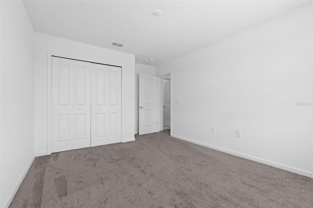 617 Hitch Loop, Saint Cloud, FL 34772 - unfurnished bedroom with carpet flooring and a closet