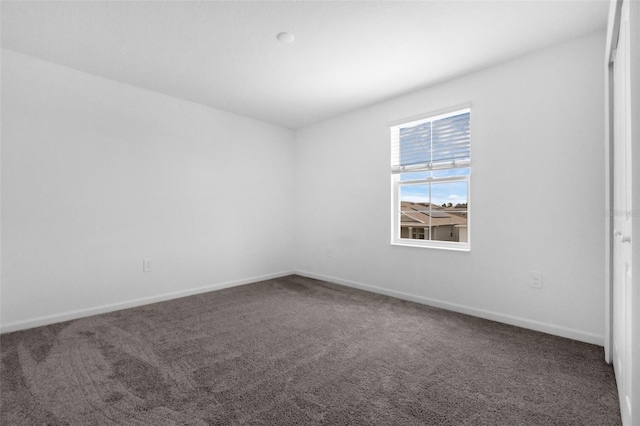 617 Hitch Loop, Saint Cloud, FL 34772 - spare room featuring carpet flooring and baseboards