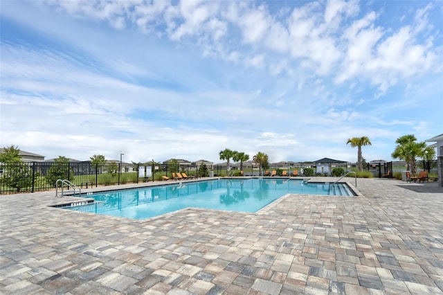 617 Hitch Loop, Saint Cloud, FL 34772 - community pool with a patio area