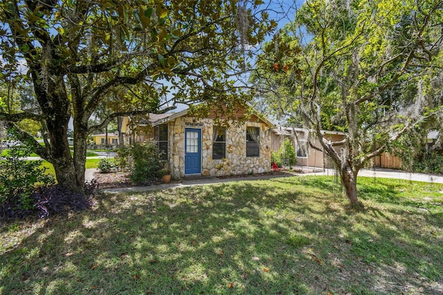 1108 W Minnehaha Ave, Clermont, FL 34711 - view of front of house featuring stone siding