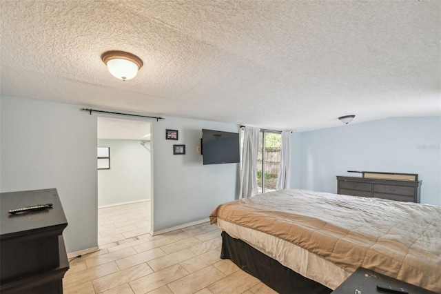 1108 W Minnehaha Ave, Clermont, FL 34711 - bedroom with a textured ceiling and baseboards