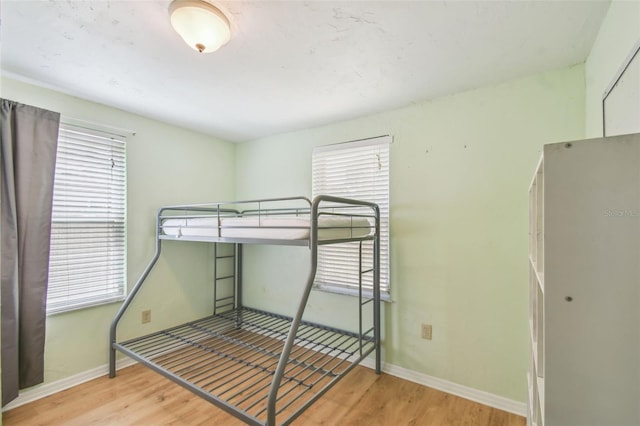 1108 W Minnehaha Ave, Clermont, FL 34711 - unfurnished bedroom with wood finished floors