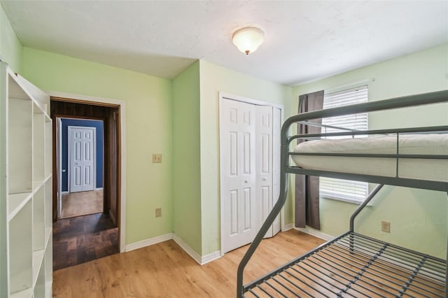 1108 W Minnehaha Ave, Clermont, FL 34711 - unfurnished bedroom featuring light wood-type flooring and a closet