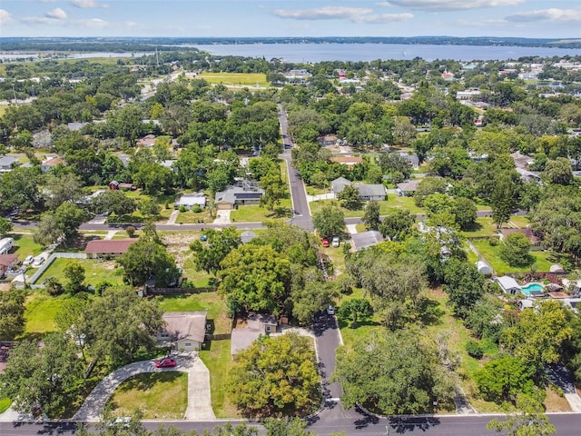 1108 W Minnehaha Ave, Clermont, FL 34711 - aerial perspective of suburban area with a large body of water