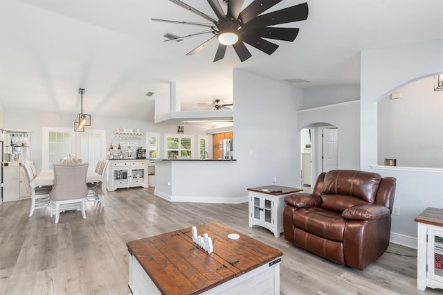 198 Porto Velho St, Punta Gorda, FL 33983 - living area featuring arched walkways, a ceiling fan, lofted ceiling, and light wood-style floors